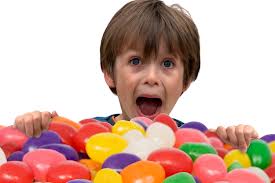kid devouring jelly beans